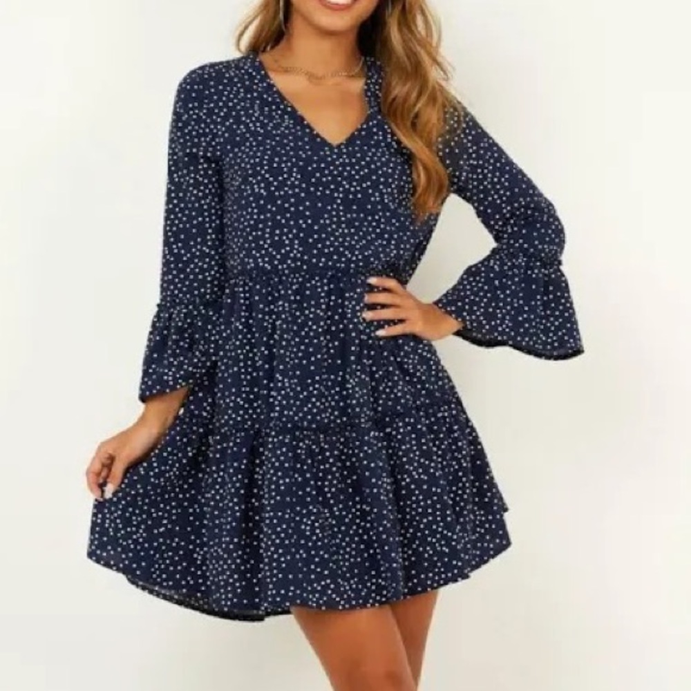 never worn before long sleeve navy blue dress with polka dots.